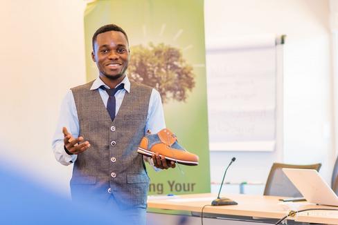 From banker to successful shoe maker